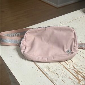 lululemon pale pink logo strap belt bag